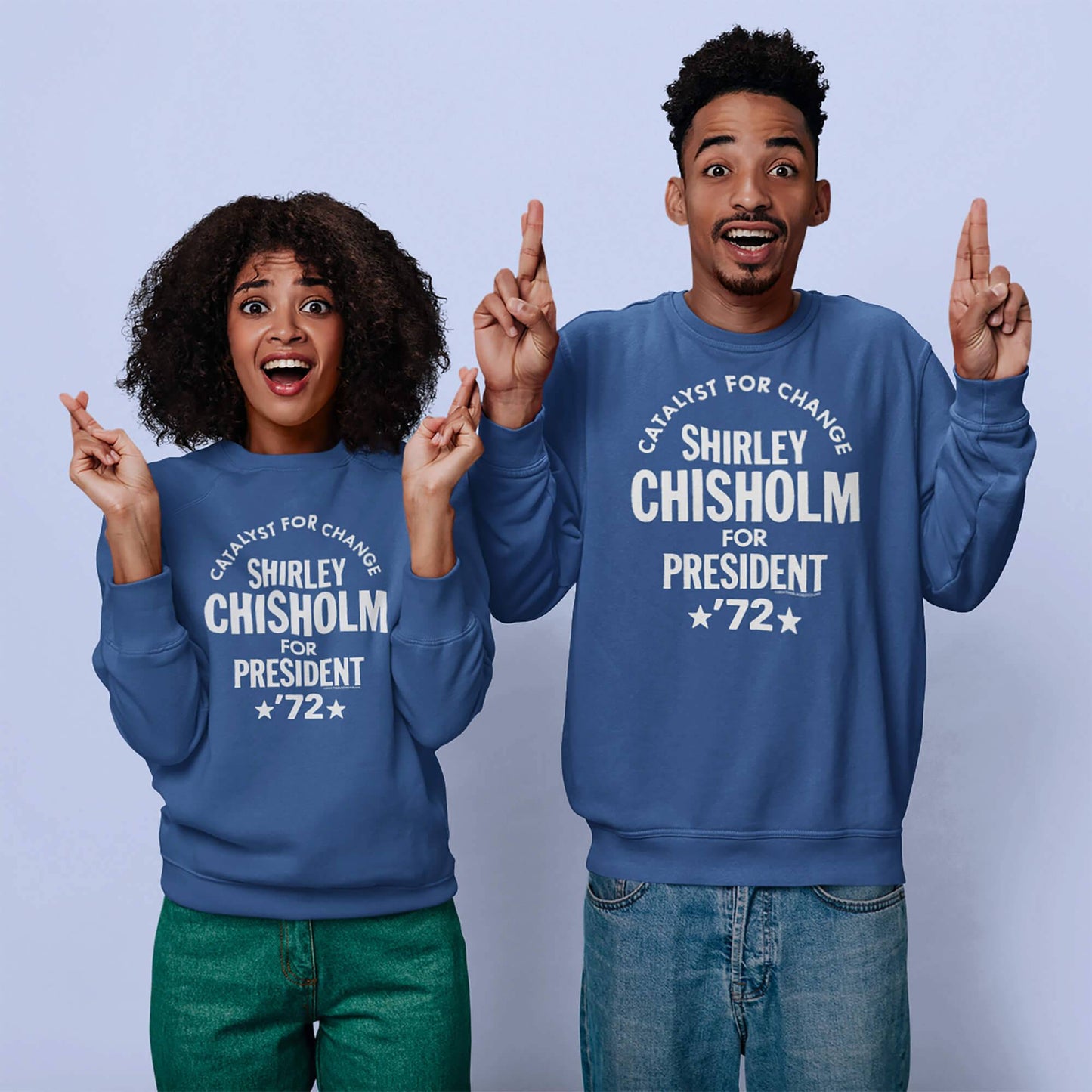 Two individuals wearing blue 'Shirley Chisholm For President 72' sweatshirts, showcasing a unisex design perfect for casual wear.