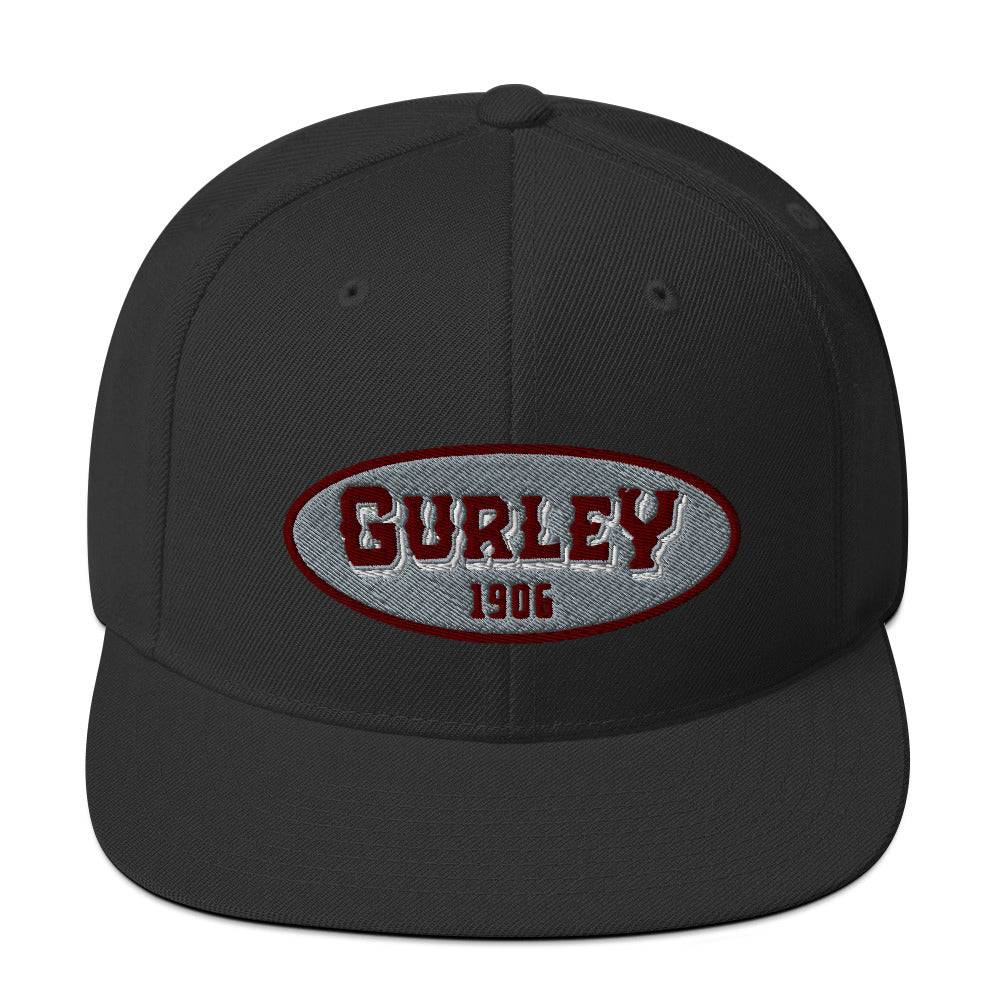 a black hat with a red and white logo