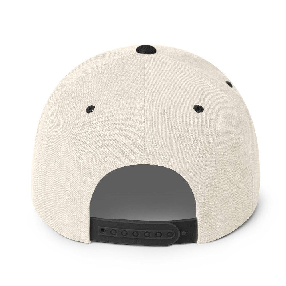 a white hat with a black patch on the front
