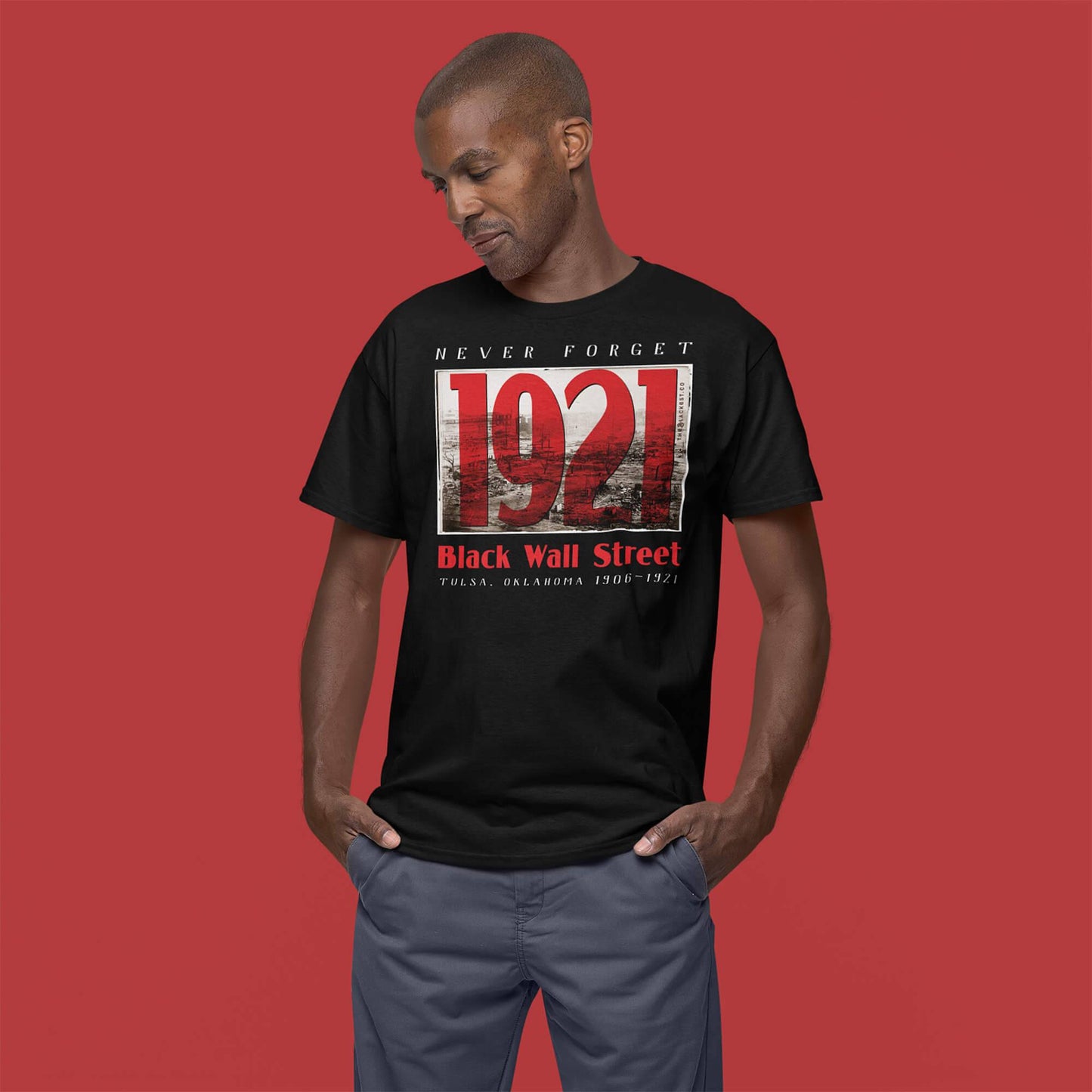 Man wearing Black Wall Street 1921 tribute t-shirt
