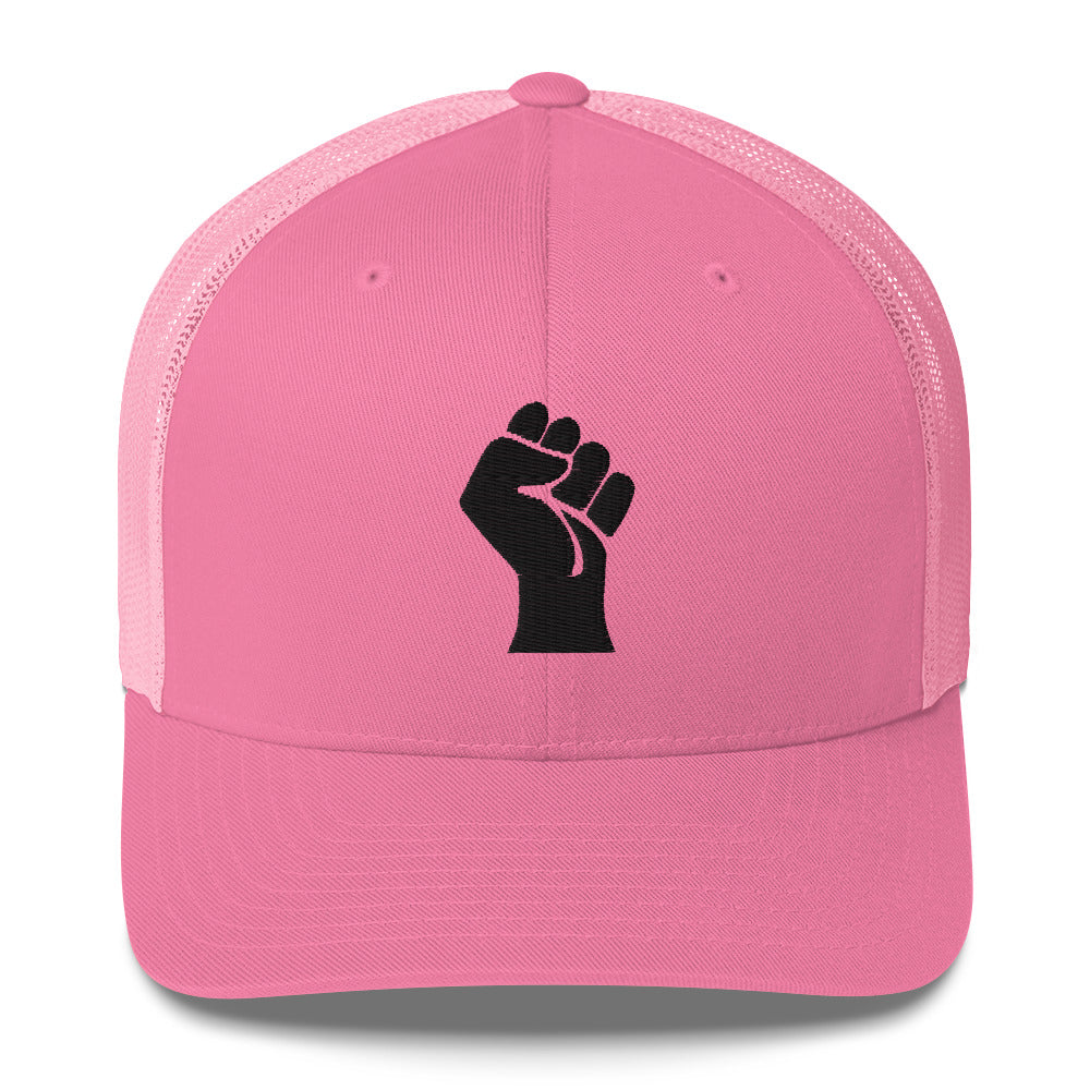 Front view of pink embroidered Black Power Fist trucker cap