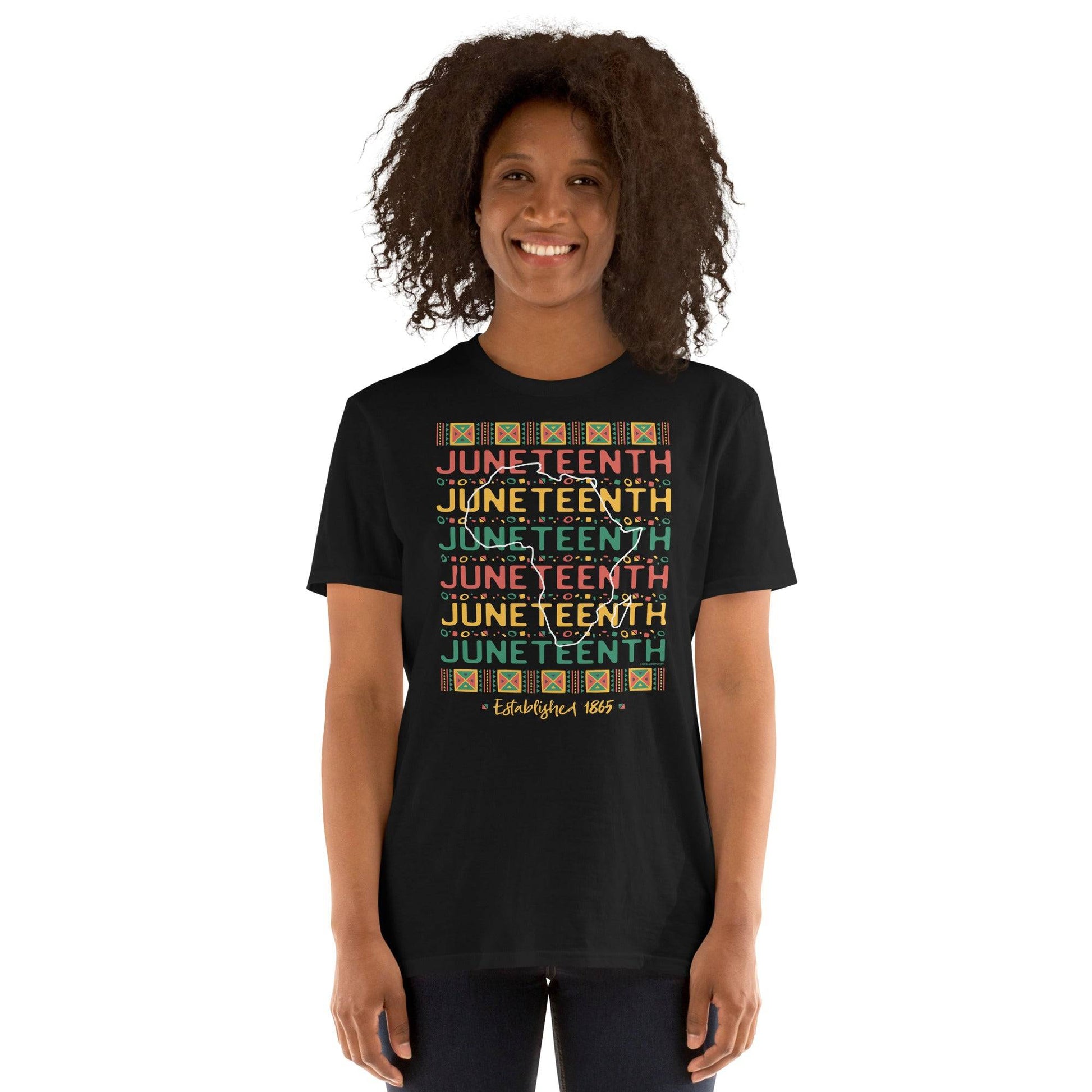 a woman wearing a black t - shirt with the words Juneteenth Repeat Established 1865 on it