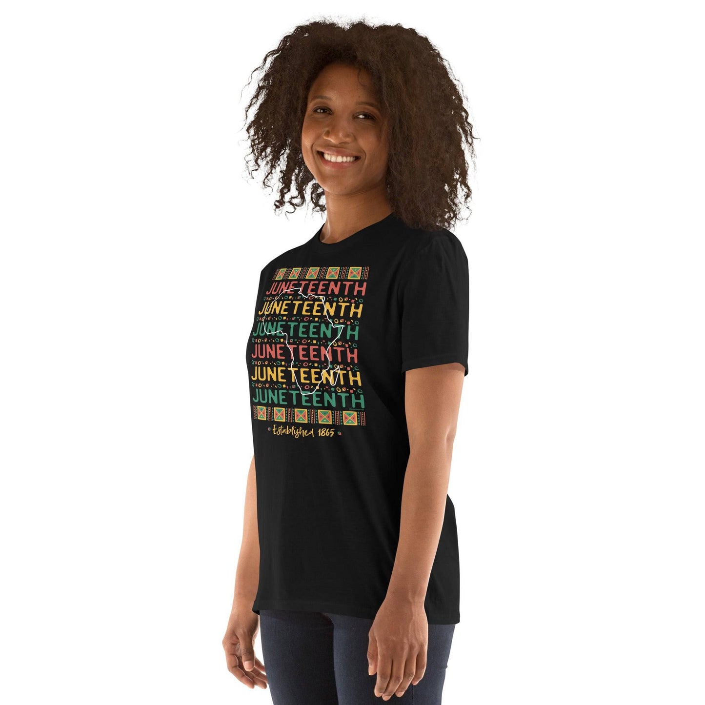 a woman wearing a black t - shirt with the words Juneteenth Repeat Established 1865 on it