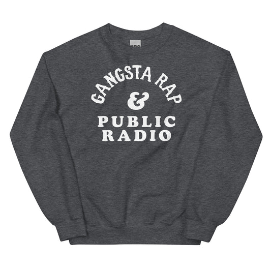 Gangsta Rap And Public Radio Unisex Staple Sweatshirt in dark heather gray with bold white text, classic crewneck fit for streetwear style.