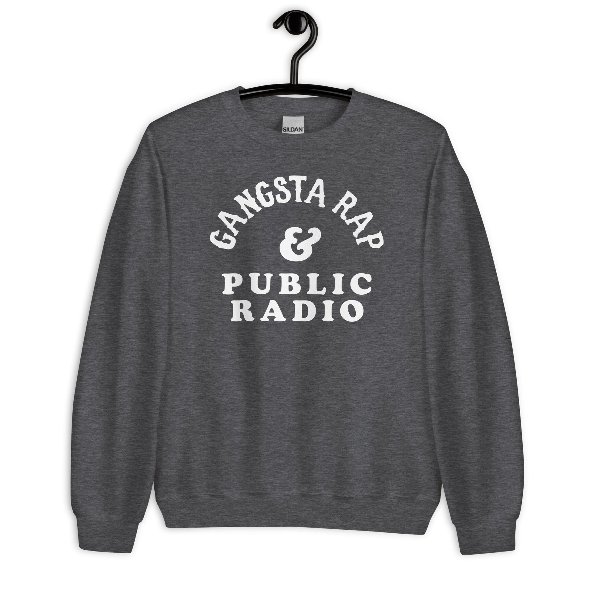 Gangsta Rap And Public Radio Unisex Staple Sweatshirt in dark heather gray on hanger, highlighting bold graphic and soft cotton blend.