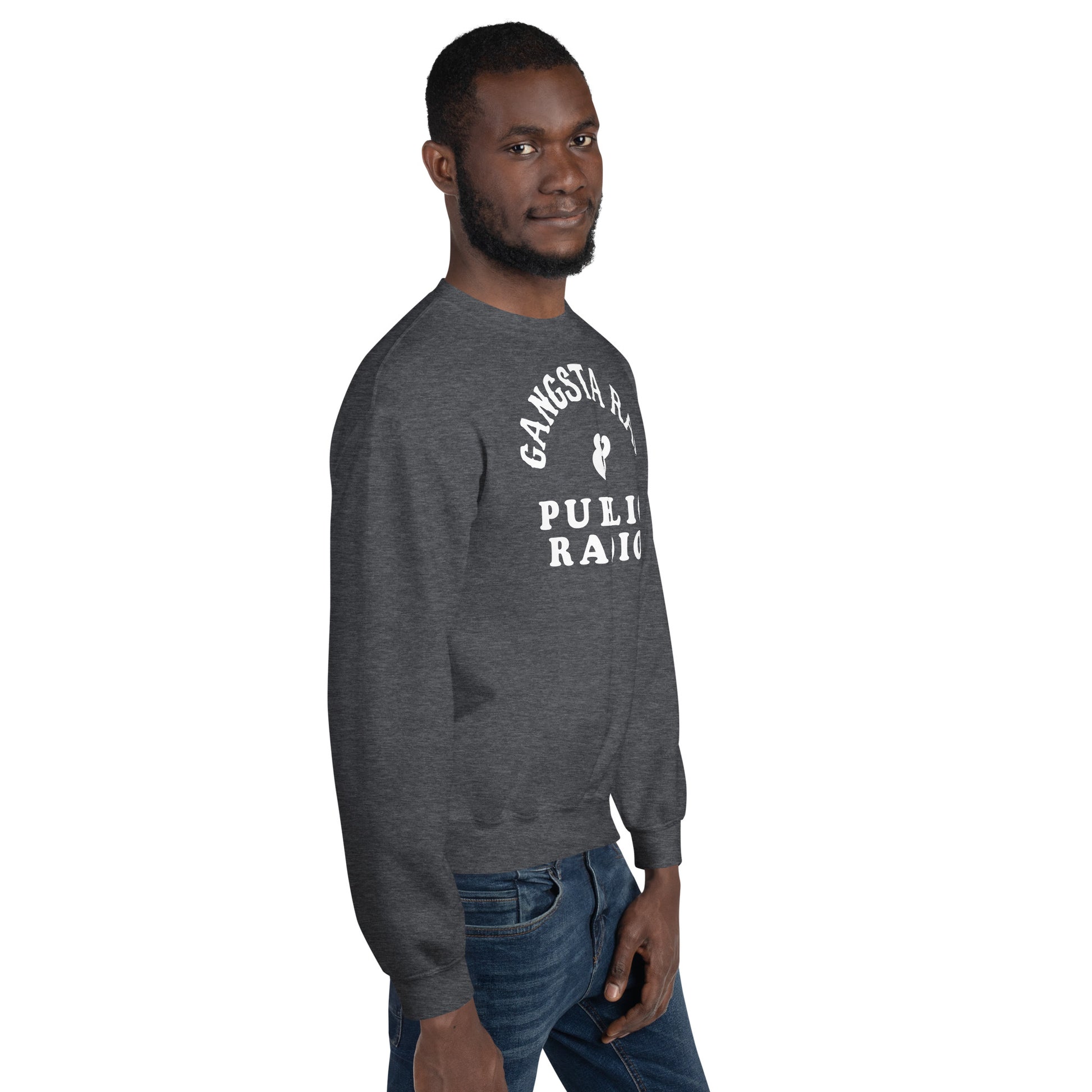 Side view of man modeling Gangsta Rap And Public Radio Unisex Staple Sweatshirt in dark heather gray, highlighting relaxed fit and soft fleece fabric.