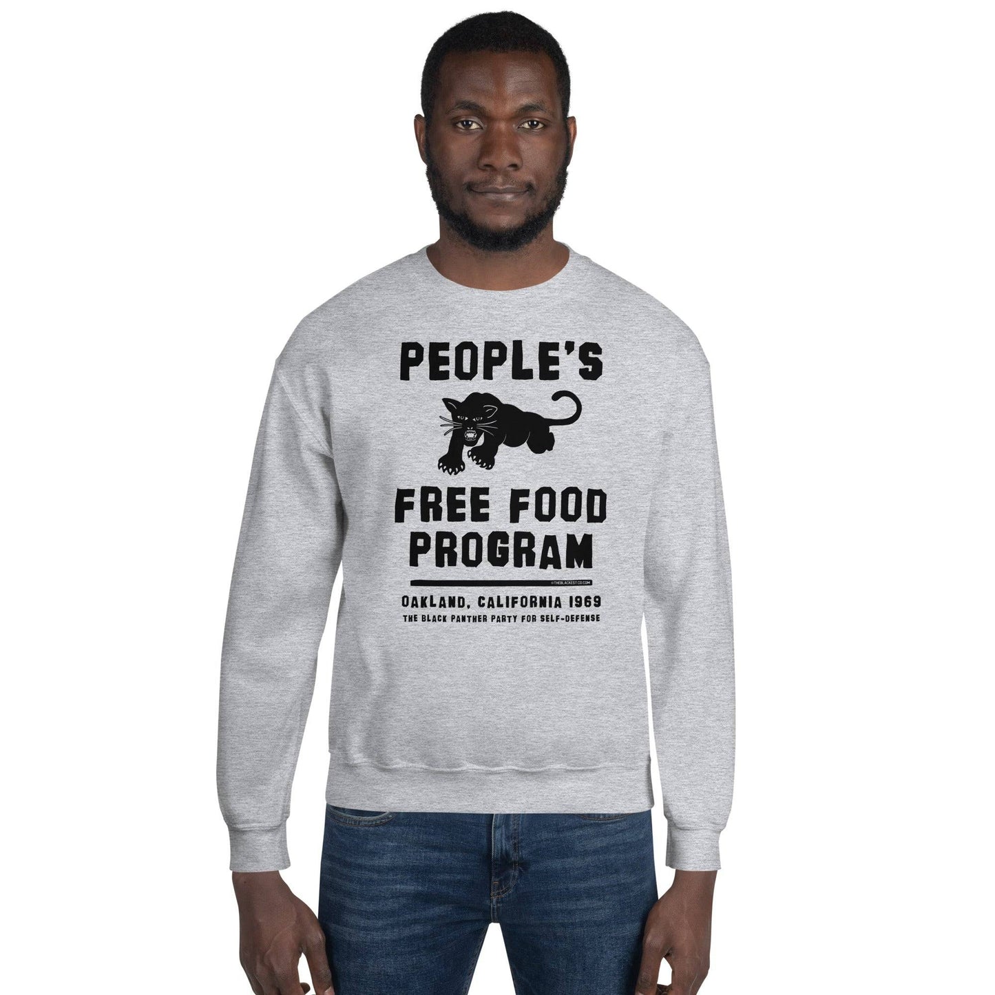 a man wearing a sweatshirt that says people's free food program