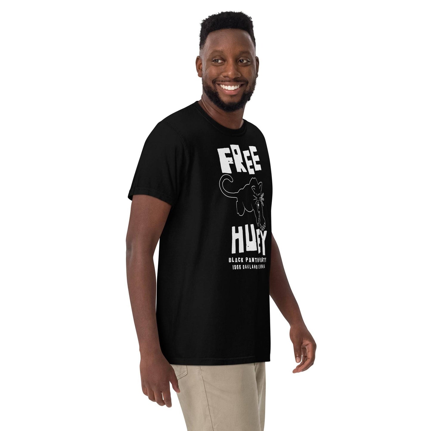 Man smiling in Free Huey Black Panther Party t-shirt
