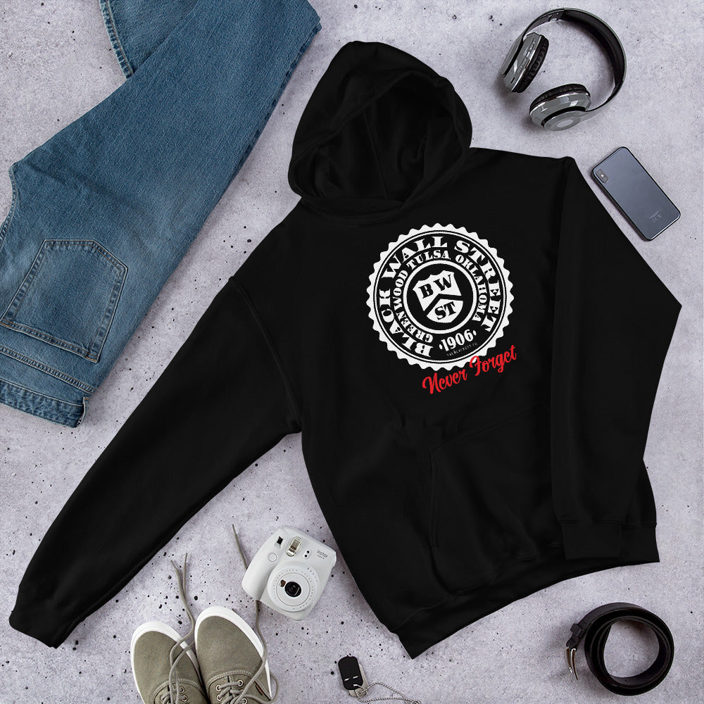 Flat lay of Black Wall Street Seal Never Forget pullover hoodie with accessories. A versatile and comfortable hoodie for everyday wear.