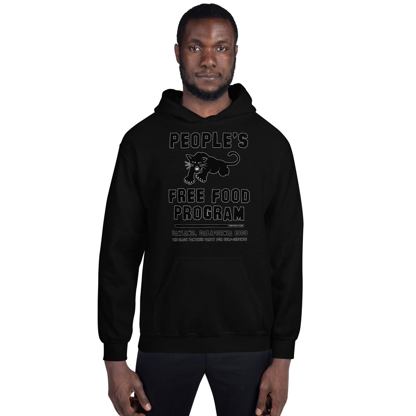 Model wearing Black On Black BPP Free Food Program Staple Hoodie, showcasing front design with panther logo and tribute to Black Panther Party.