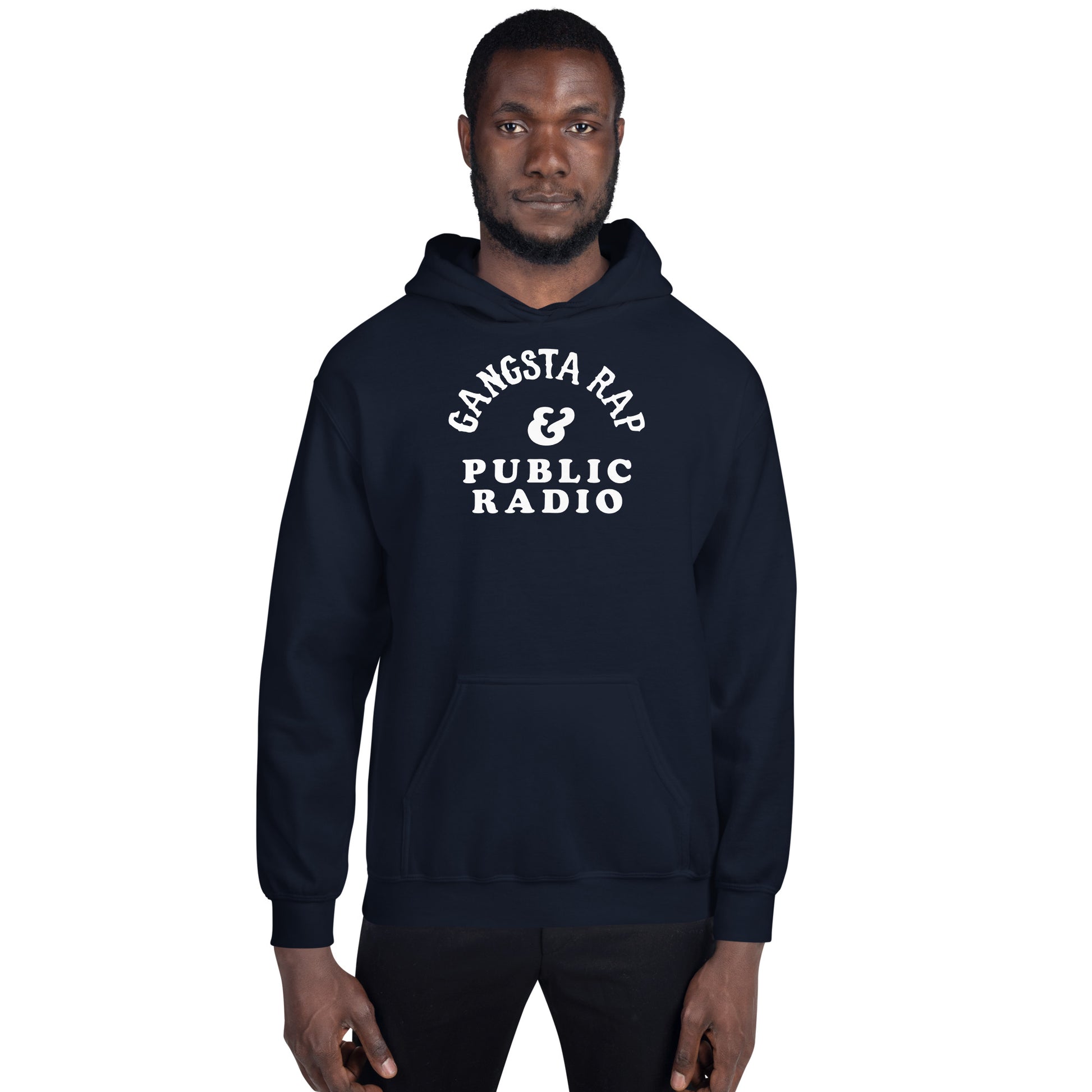 Model wearing navy Gangsta Rap And Public Radio Unisex Staple Hoodie, showcasing relaxed fit and streetwear appeal from TheBlackest Co.