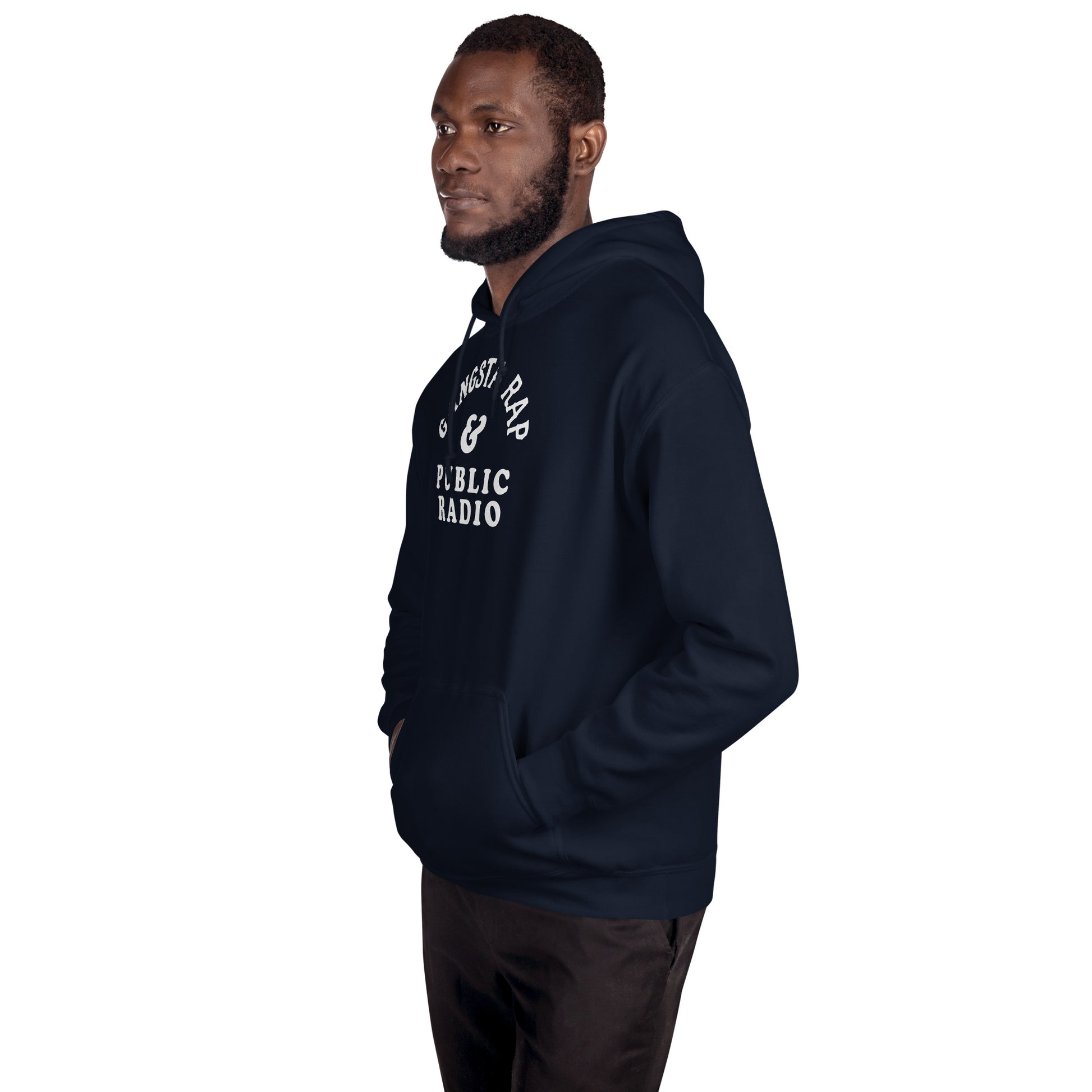Angled side view of model wearing navy Gangsta Rap And Public Radio Unisex Staple Hoodie, highlighting front pocket and hip hop vibe.