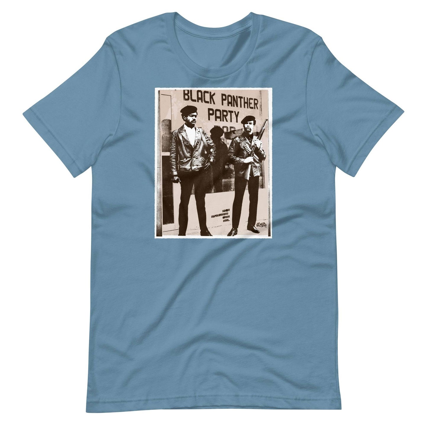 a blue t - shirt with a picture of huey newton and bobby seale standing next to each other