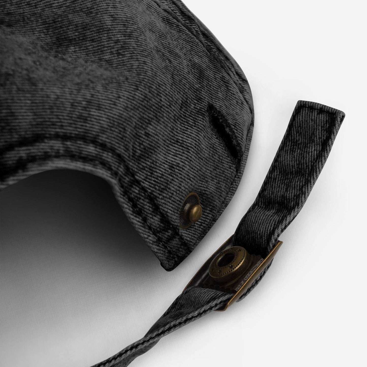 a close up of a hat on a white surface
