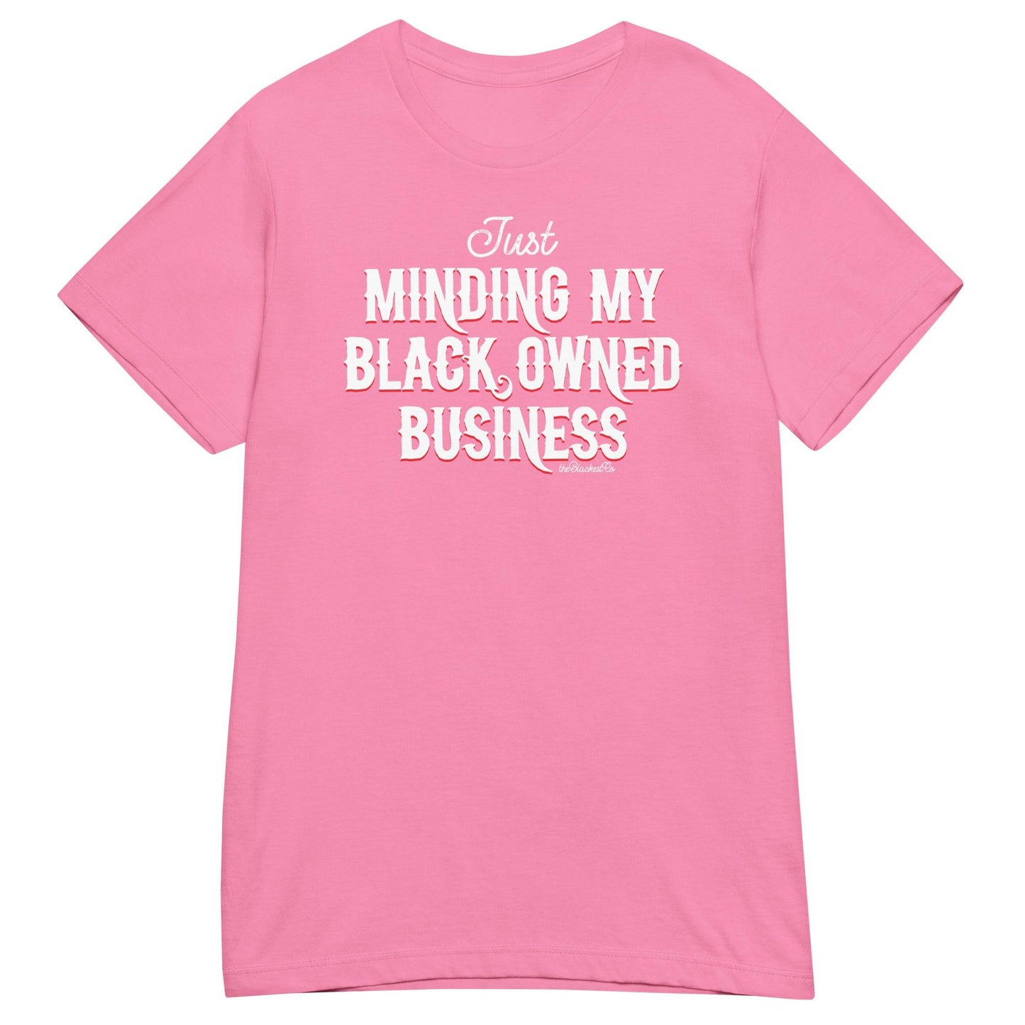 Light pink Minding My Black Owned Business Womens Softstyle Tee with soft empowering message, blending fashion and cultural pride.