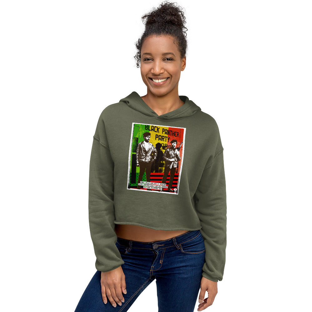 Smiling model in The Black Panther Party BPP Storefront Crop Hoodie, highlighting the cropped fit and empowering BPP graphic design.
