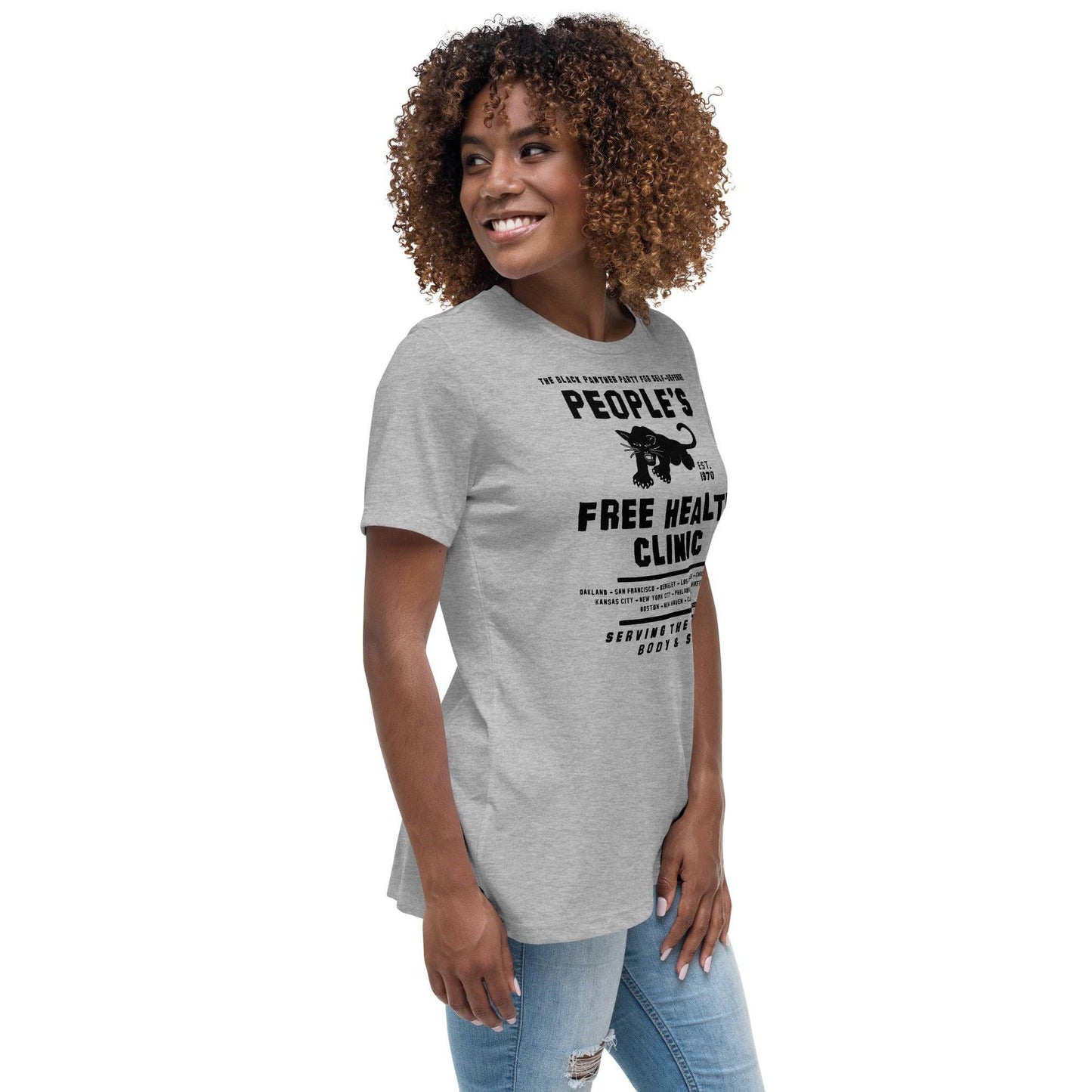 a woman wearing a grey t - shirt with a black panther on it that says people's free health clinic