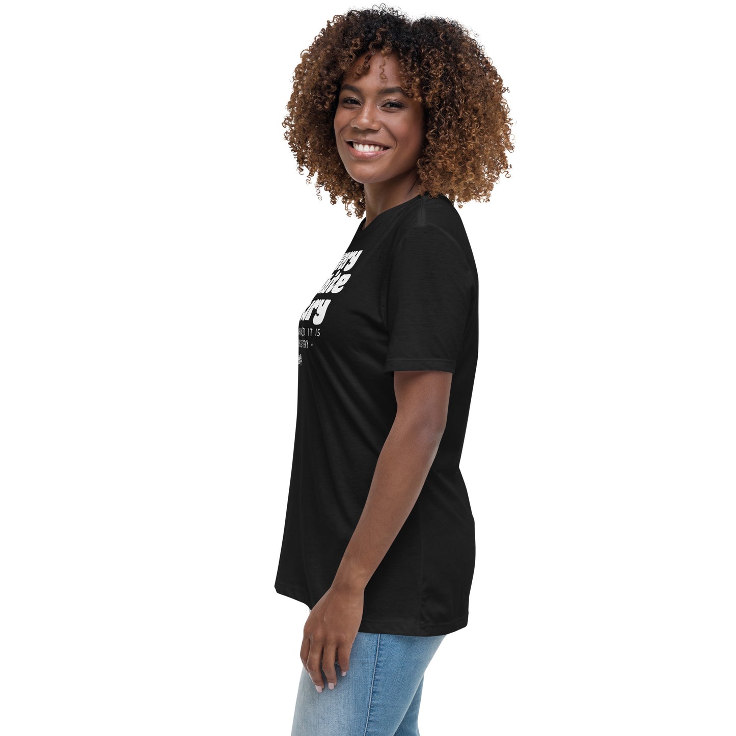 Side view of a woman wearing a black 'Slavery Is White History' t-shirt. Soft, relaxed fit, perfect for casual wear and Black history awareness.