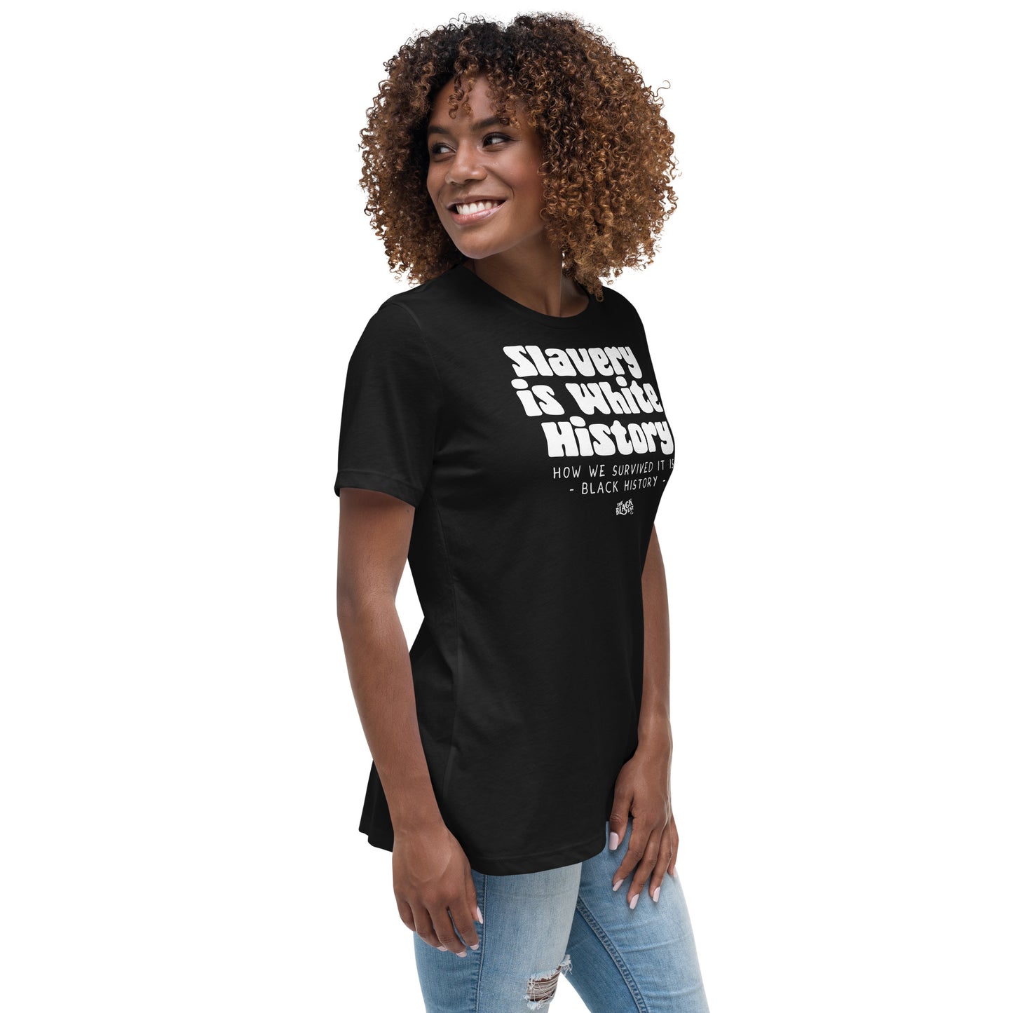 Angled side view of a woman in a black 'Slavery Is White History' t-shirt. Comfortable and stylish, ideal for everyday wear and Black history pride.
