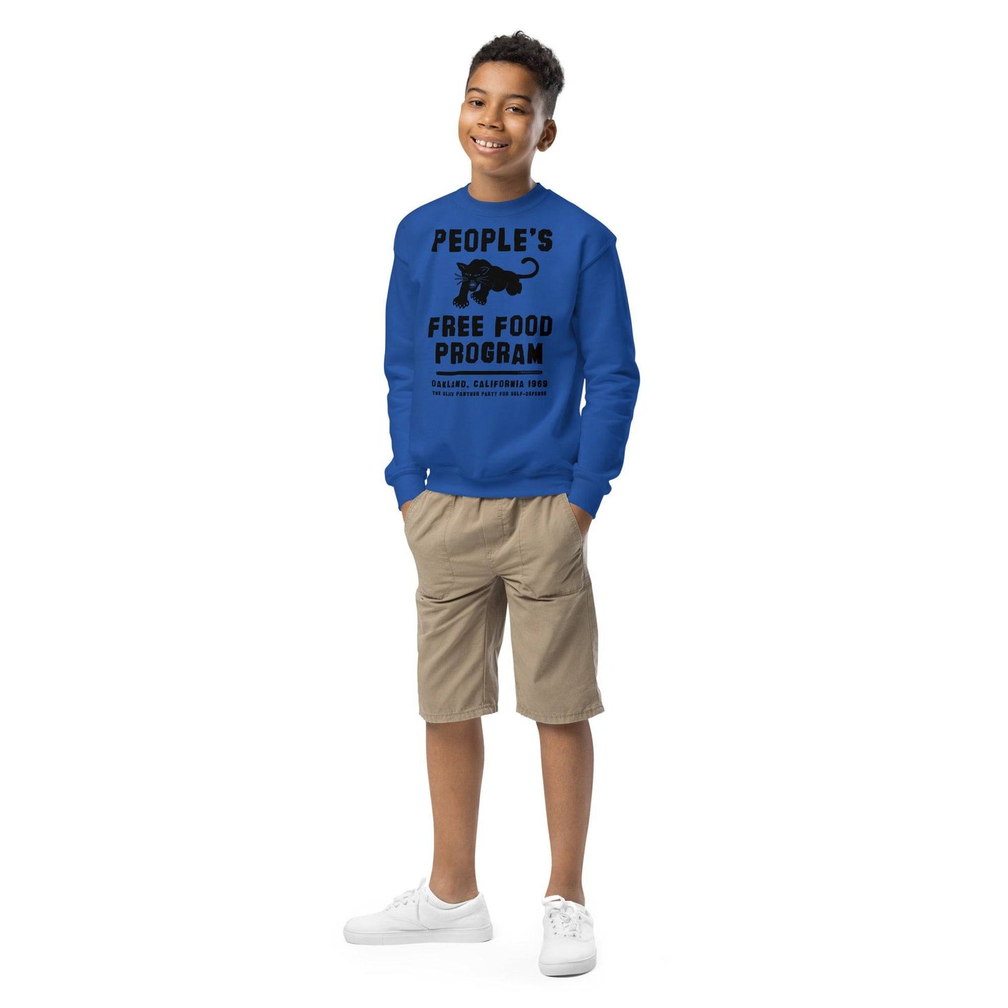 Full view of boy in blue BPP People's Free Food Program Sweatshirt
