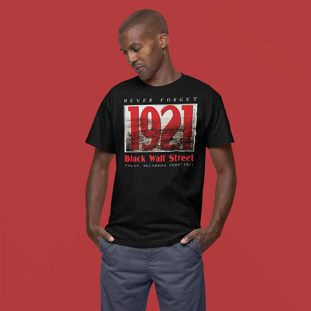young smiling black man wearing black wall street 1921 t-shirt