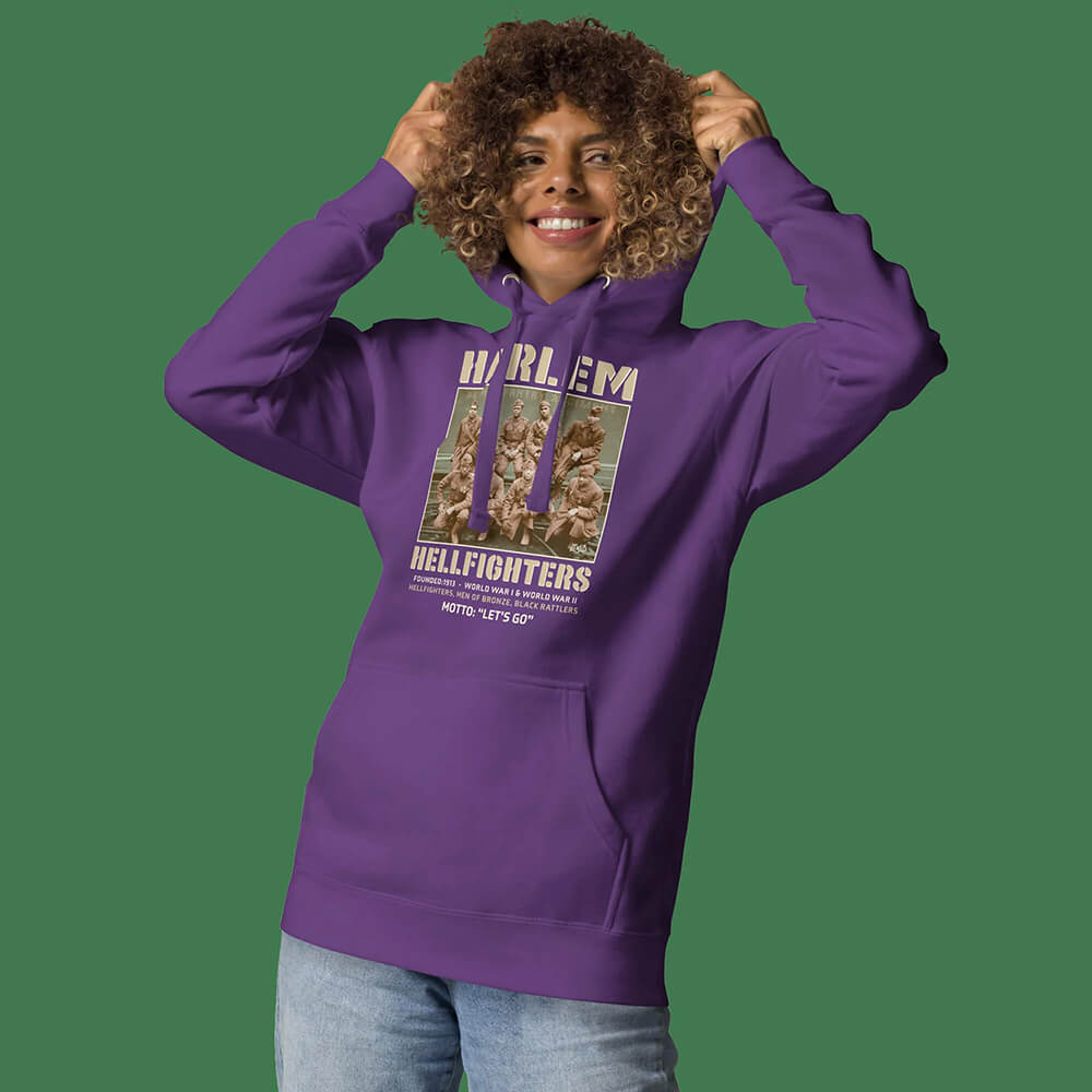 smiling woman in a black history hoodie by theblackest co