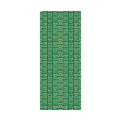 Full sheet of Jesus Was Black Merry Christmas green wrapping paper with repeating pattern, perfect for festive and meaningful gift wrapping.
