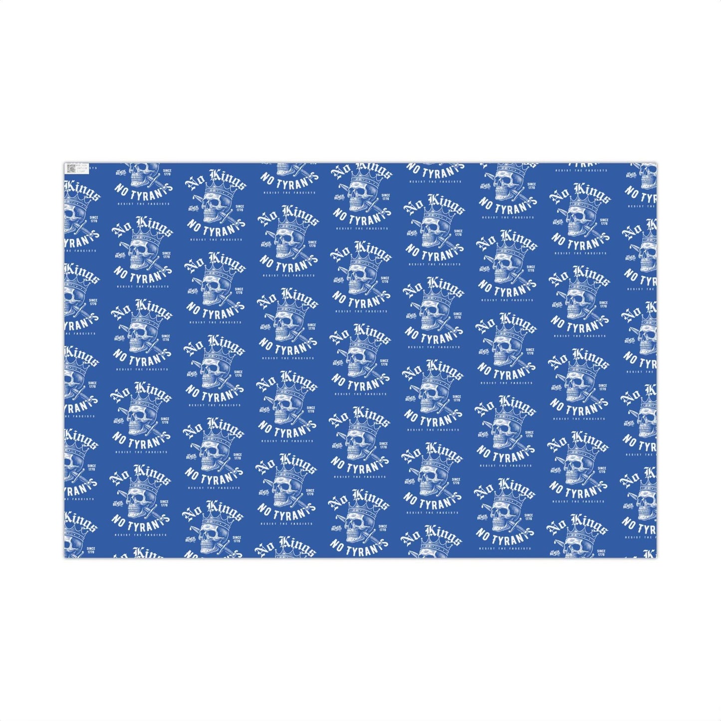 Flat sheet of No Kings No Tyrants Christmas Gift Wrapping Paper by TheBlackest Co. featuring bold white skull and protest text on matte blue background.