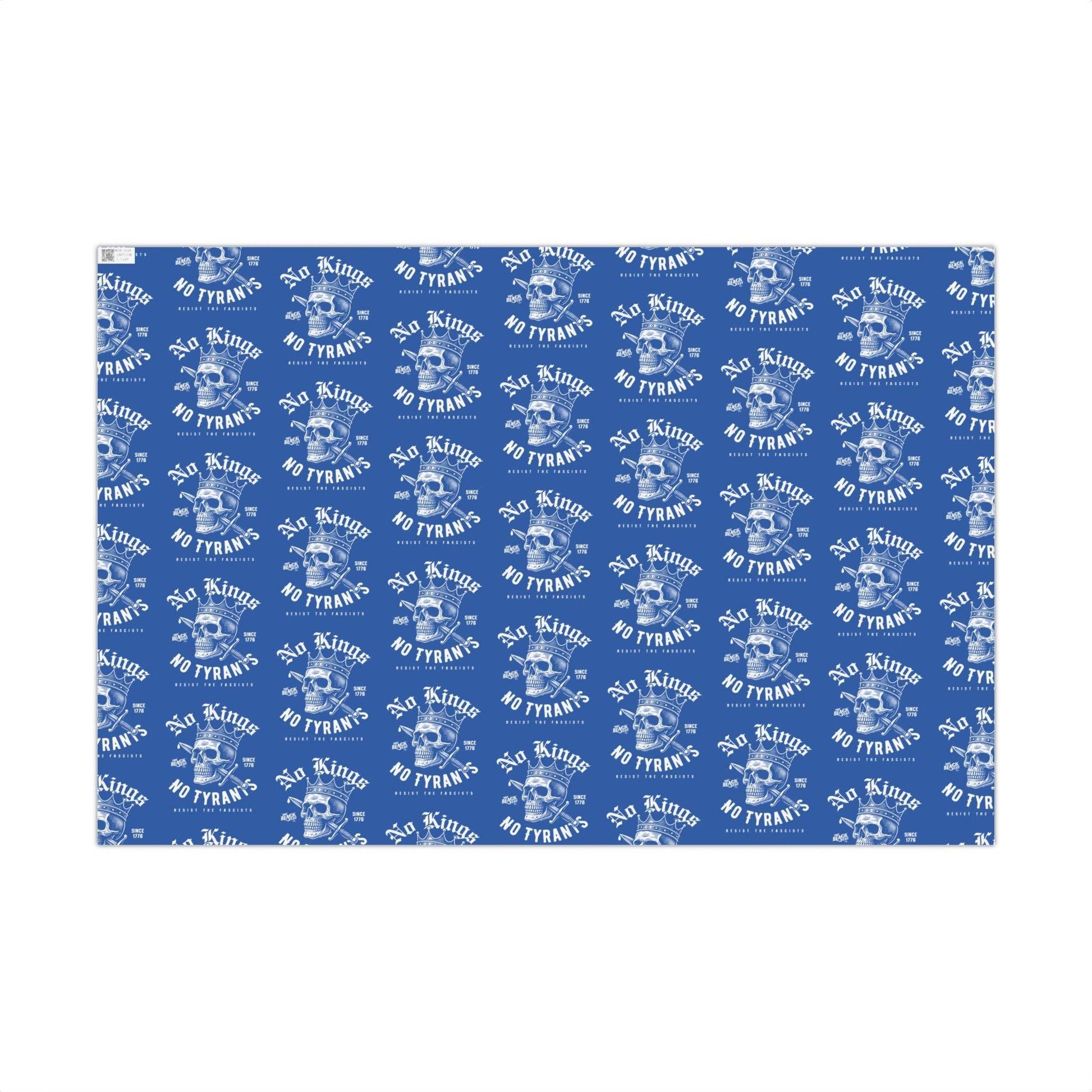 Flat sheet of No Kings No Tyrants Christmas Gift Wrapping Paper by TheBlackest Co. featuring bold white skull and protest text on matte blue background.