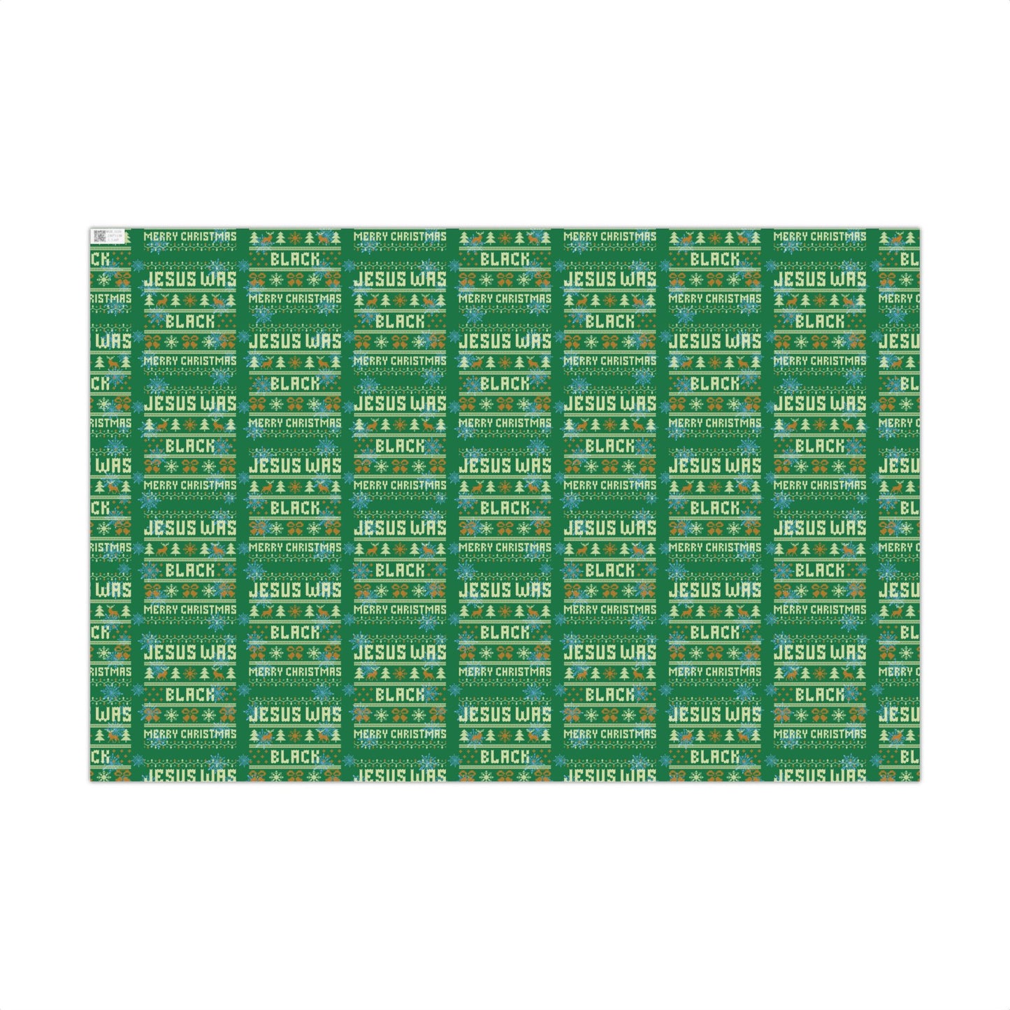 Flat sheet of Jesus Was Black Merry Christmas green wrapping paper with repeating festive print, ideal for statement holiday gift wrap.