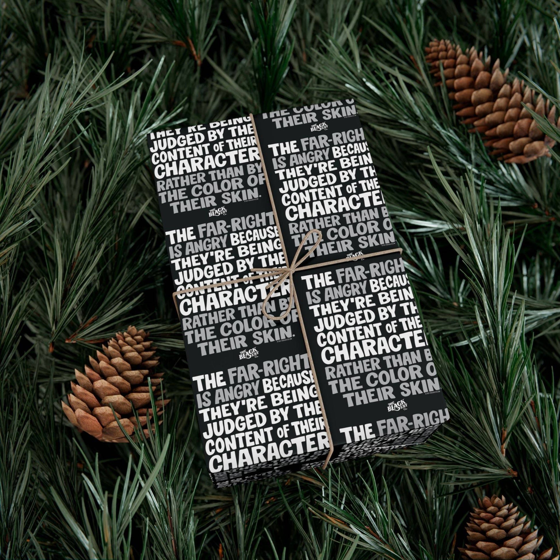Wrapped gift in Why The Far Right Is Angry Christmas Gift Wrapping Paper nestled in pine branches, highlighting bold anti-racist holiday packaging.
