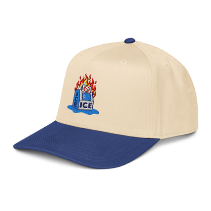 Side view of beige and blue Abolish ICE Burning Machine Snapback Cap with mid-profile structure and protest-themed embroidery.