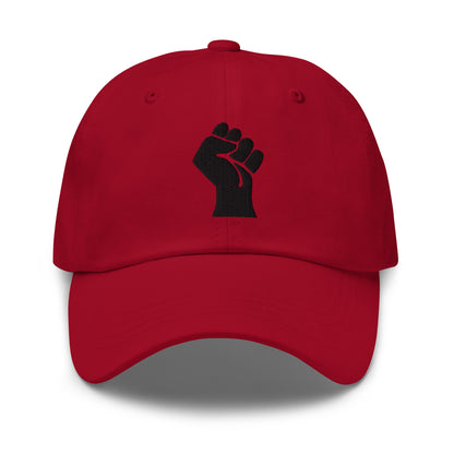 Red Black On Black Power Fist Embroidered Baseball Cap with striking contrast, ideal for bold fashion and activism.