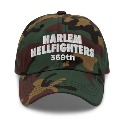 Camouflage Harlem Hellfighters 369th cap with white embroidery. Military-style baseball hat honoring WWI Black soldiers with bold statement design.