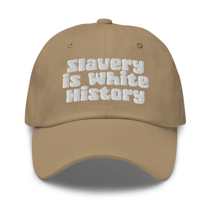 Khaki Slavery Is White History Embroidered Dad Hat by TheBlacket Co., soft cotton cap with curved brim and bold white statement text.