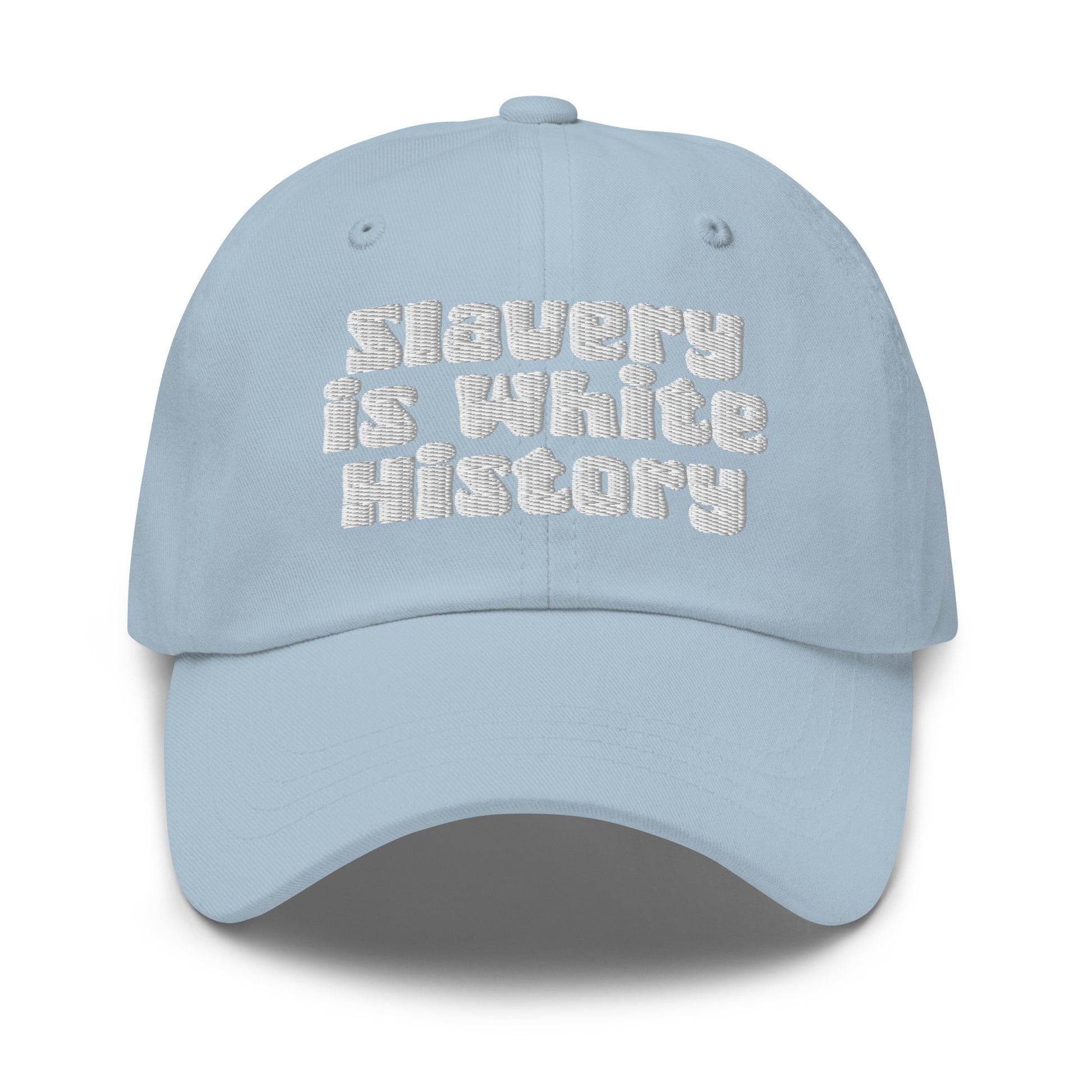 Light blue Slavery Is White History Embroidered Dad Hat by TheBlacket Co., casual unstructured cap with white text and adjustable fit.