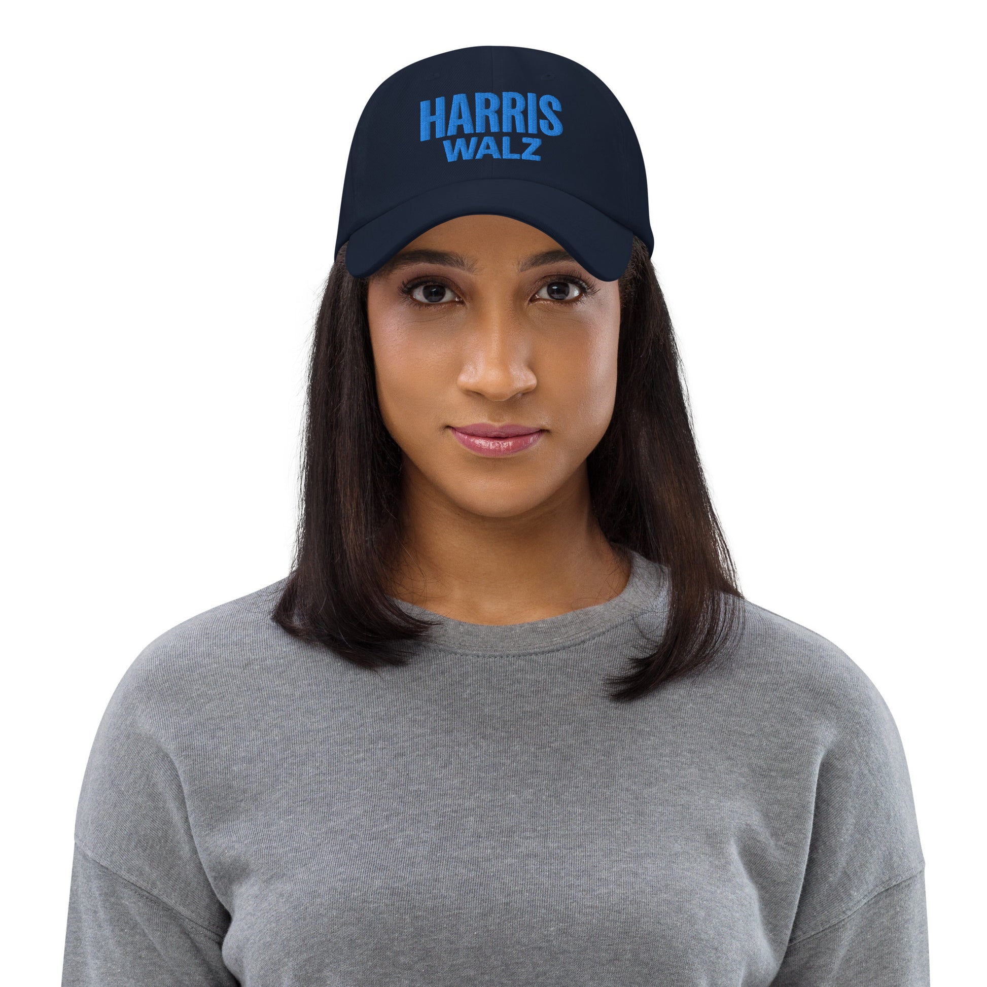 Front view of Harris Walz dad hat on woman