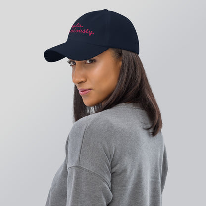 Woman wearing Kamala Obviously embroidered navy cap