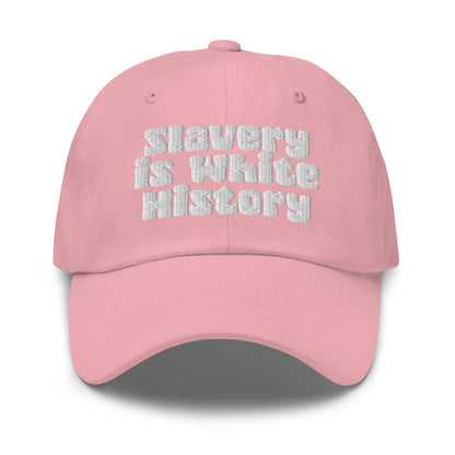 Pink Slavery Is White History Embroidered Dad Hat by TheBlacket Co., stylish pastel cap with impactful embroidered message in white.