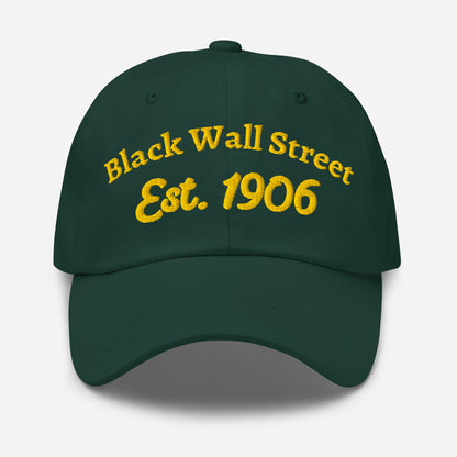 Dark green Black Wall Street Est. 1906 Baseball Cap with gold embroidery, curved visor and adjustable strapback.