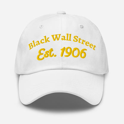 White Black Wall Street Est. 1906 Baseball Cap with bright yellow embroidery, classic curved visor and cotton fabric.