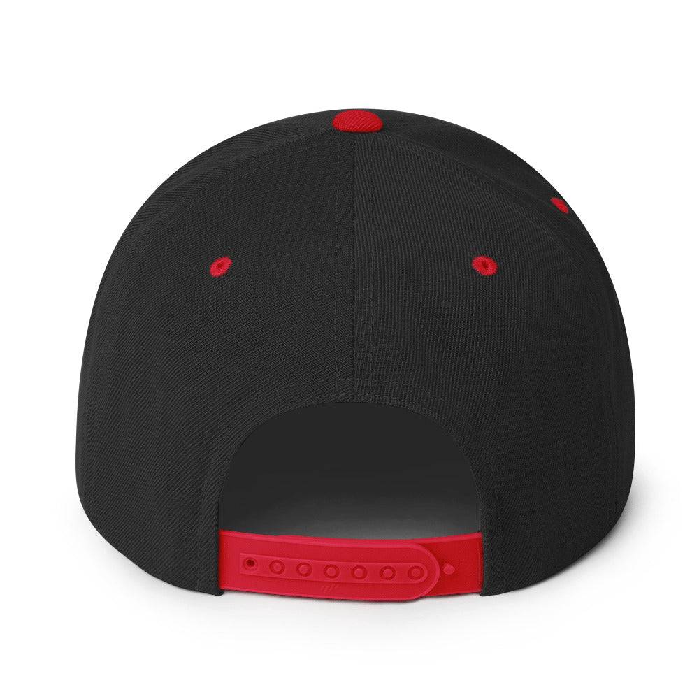 a black and red hat with a red visor