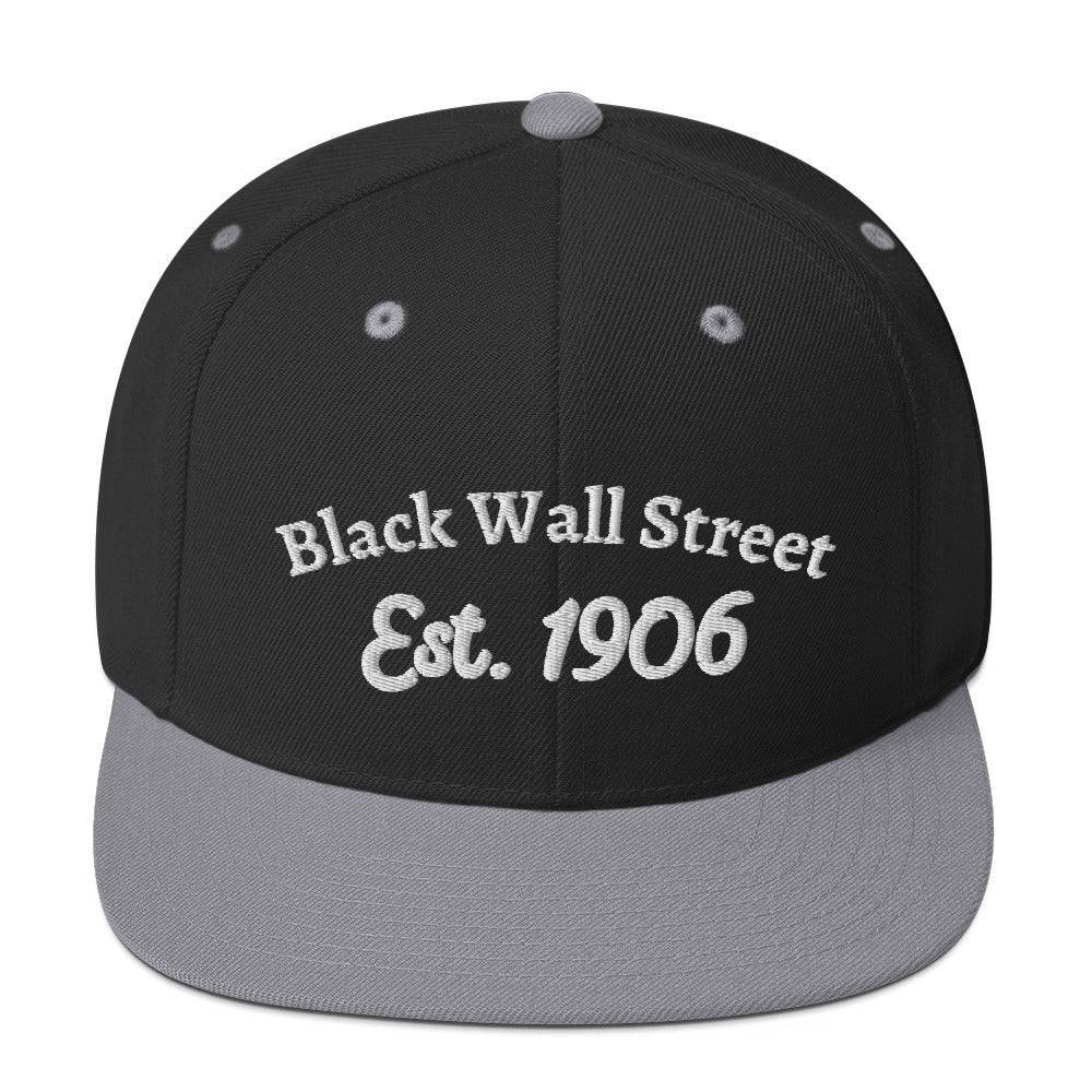 black and grey snapback hat with black wall street est. 1906 embroidery 