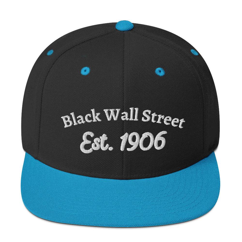 a black and blue hat with the words black wall street on it