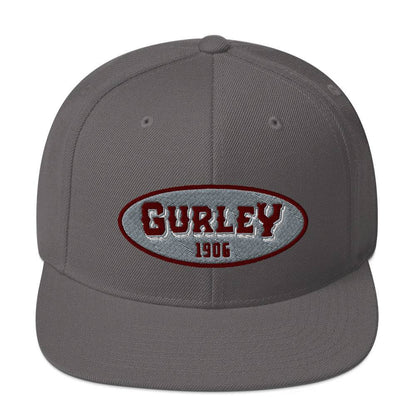 a grey hat with the word gurley on it