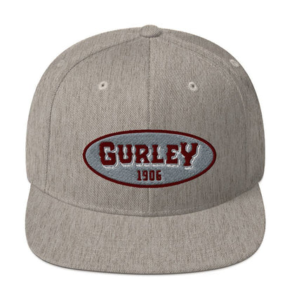 a grey hat with the word gurley on it