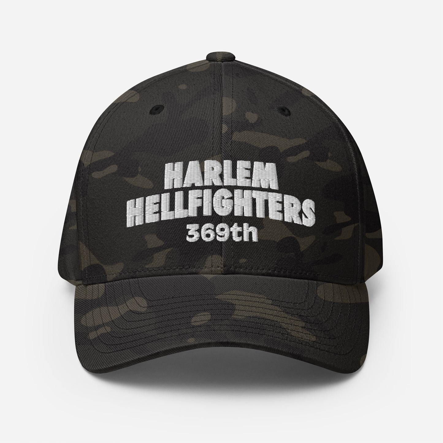 Front view of 369th Harlem Hellfighters Flexfit® Cap in black camo with bold white embroidery. Athletic fit with curved visor for modern style.