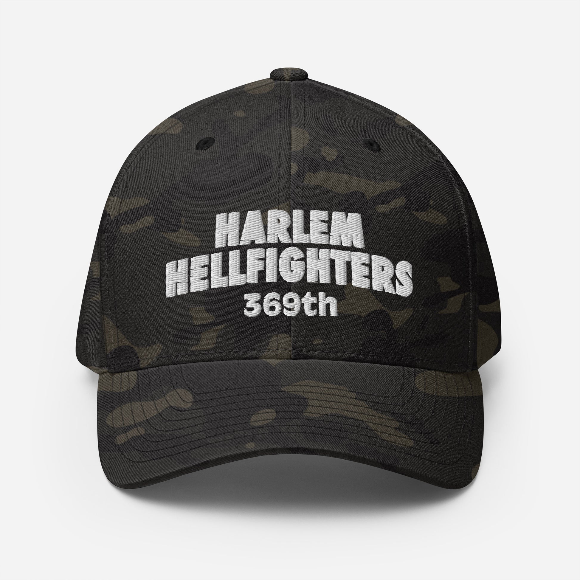 Front view of 369th Harlem Hellfighters Flexfit® Cap in black camo with bold white embroidery. Athletic fit with curved visor for modern style.