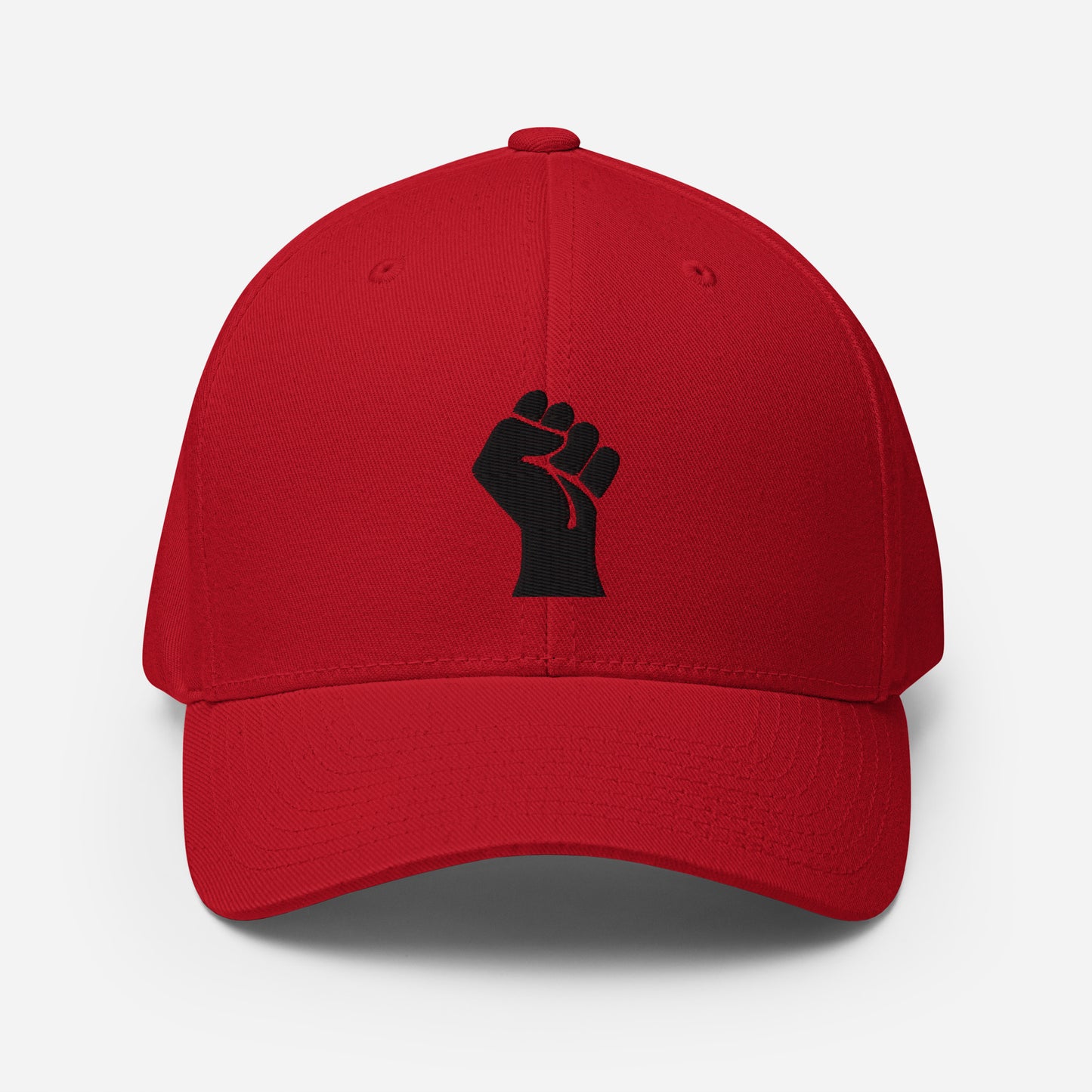 Red Flexfit structured cap featuring black embroidered power fist, a bold statement piece from TheBlackest Co. with stretch-fit comfort.