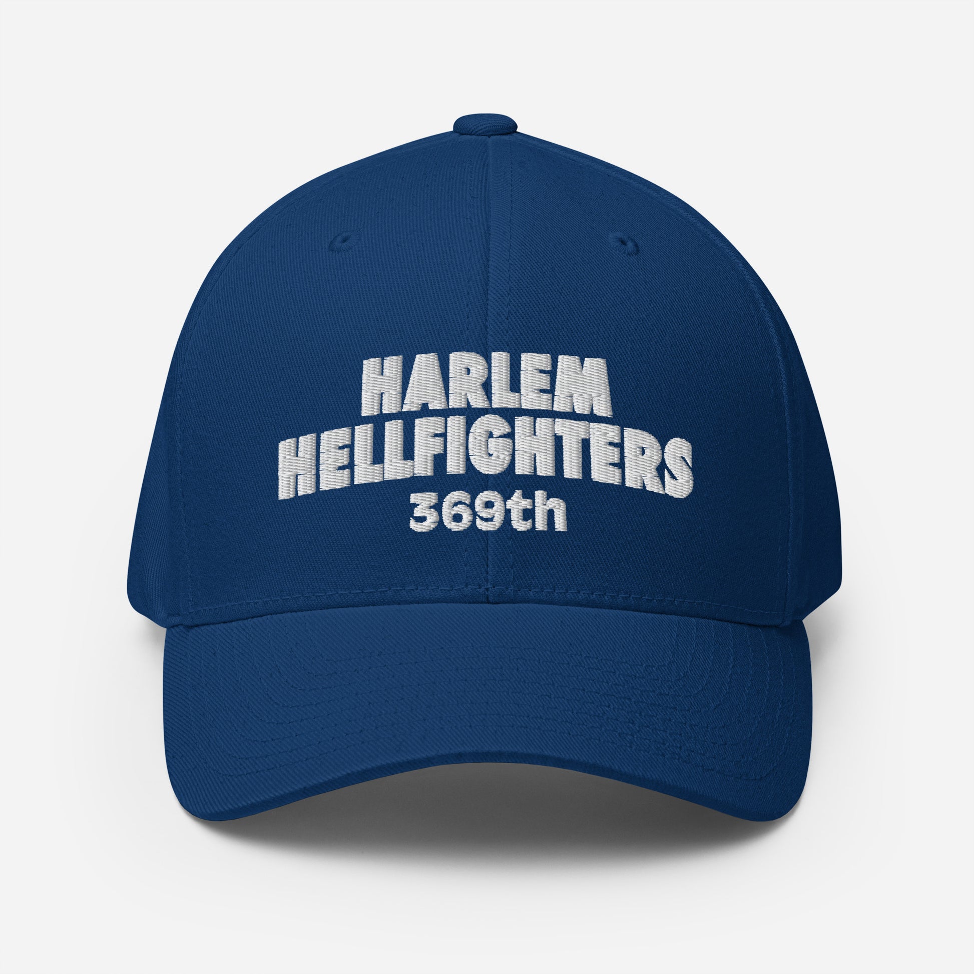 369th Harlem Hellfighters Flexfit® Cap in royal blue with bold white embroidery. Fitted cap with curved visor and stretch band.